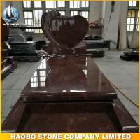 heart shaped rose carved headstone with red granite stone